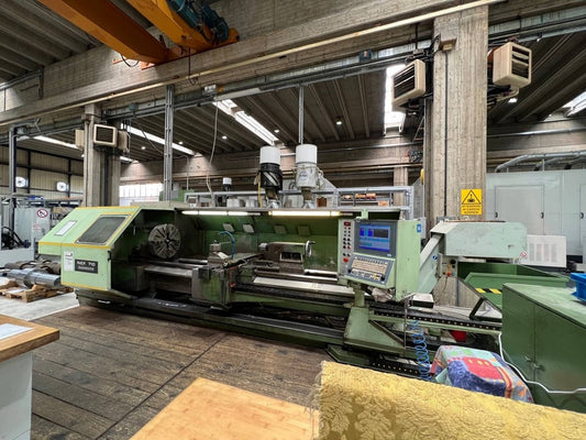 Tornio cnc banco piano GILDEMEISTER NEF 710×3000 usato